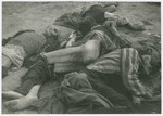 Corpses lie on the grounds of either Buchenwald or Ohrdruf concentration camp.