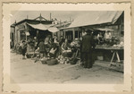 Polish farmers sell their produce in an outdoor market in Radom.