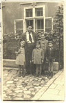 Jonas Eckstein poses with Jewish orphans from Poland that he sheltered after they were smuggled over the border into Slovakia.