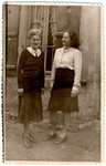 French rescuers, Marie-Therese Maunier and Genvieve Maunier-Valentine, stand outside their home.