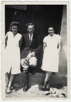 Dr. Malkin poses with his aides outside the infirmary at the Rivesaltes internment camp.