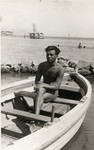 Joseph (Beppo) Hajon (b. 1905, uncle of the donor) sits in a small row boat.