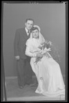 Studio wedding portrait of Miklos Grun and his bride.