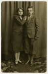 A portrait of Elaine and Max Levine. On the reverse side is a greeting for their aunt and uncle in America for the Jewish New Year.