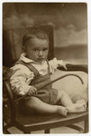 A portrait of a young boy (son of Basia and member of the Levine family) who later perished in the Holocaust.
