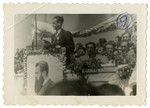 Solomon Manischewitz, the donor, speaks from a podium in front of a crowd at an assembly announcing the proclamation of the state of Israel.