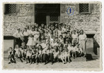 Group portrait of students and teachers of the Henrietta Szold Hebrew school in the Zeilsheim DP center.