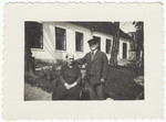 A rabbi and his wife pose in front of their home which also served as the town's synagogue.