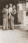 A Jewish DP child poses with two young men at the children's home in Selvino, Italy.