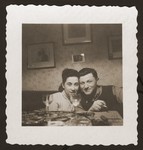 Two Jewish DP siblings, who have been recently reunited, pose in an apartment in the New Palestine displaced persons camp near Salzburg.