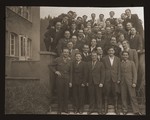 Group portrait of Jewish DPs and American soldiers at the Heidenheim displaced persons camp.