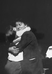 Renée Pallarès hugs Diane Popowski, a Jewish child from Luxembourg, whom Renée's family adopted after she was rescued from a nearby internment camp.