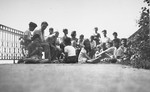 Jewish refugee children sit on the terrace of the children's home in Izieu.