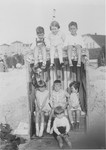 A group of children pose in a cabana on the beach in Duhnen, Germany.