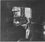 Wolfgang Schaechter poses in a garage in the Enns displaced persons camp.