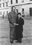 Alexander and Wolfgang Schaechter pose outside in the Enns displaced persons camp.