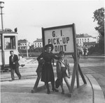 Friederike and Wolfgang Schaechter at a tram stop near the Enns displaced persons camp.