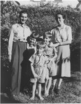 Walter and Emma Gianinni pose with three children in the Faverges children's home.