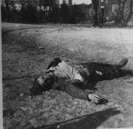 The corpse of an SS guard killed by survivors in Ohrdruf.