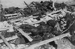 The charred remains of prisoners hastily burned by camp personnel prior to the evacuation of Ohrdruf.