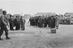 German civilians are assembled before being detailed to collect and bury the victims of the Langenstein-Zwieberge concentration camp.