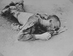 A charred corpse in the Leipzig-Thekla sub-camp of Buchenwald.