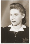 Portrait of Sara Kirschenbaum wearing a yellow star.
