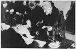 Jewish residents register in an unidentified ghetto.