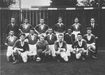 Group portrait of members of the "Red Boys" soccer team in Differdange, Luxembourg.
