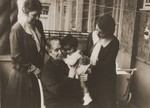 Uriel Michael Stein with his mother and grandmothers.