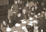 Jews rescued from Theresienstadt enjoy a warm meal in the Hadwigschulhaus in St.