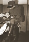 A Jewish boy, who is recuperating in the infirmary of the Hadwigschulhaus in St.