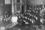 A class of medical students pose in a lecture hall at the Charles University in Prague.