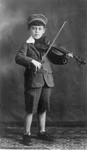 Studio portrait of Abraham Moshe Muhlbaum playing the violin.