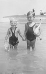 Portrait of the two Muller children, Heinrich and Alice, playing in the water at a resort in Lake Balaton, Hungary.