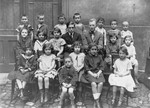 Group portrait of pupils at the Jiddvska Matice Skolska (founded by Viktor Kohn) taken on the first day of classes at the Jewish school.