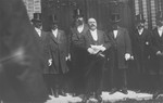 Prominent Jews dressed in top hats attend the dedication of the synagogue in Rastenburg, East Prussia.