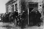 Jews in the Warsaw ghetto awaiting their turn in the soup kitchen.