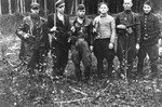 A Jewish partisan group in the Rudninkai forest.  

On the far right is Max (Motl) Wischkin.