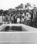 Jewish refugees and Dominicans attend the inauguration of the El Choco aqueduct in Sosua, which made possible the utilization of this mountainous region in Sosua for cattle raising.