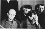 Defendants Anton Kaindl (left) and Gustav Sorge (back middle) at the Sachsenhausen concentration camp war crimes trial in Berlin.