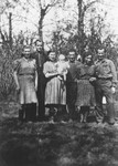 Selma and Chaim Engel (center) pose with their child and two other couples in Odessa where they were living under the assumed name of Kriseck.