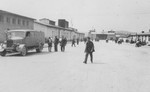 American liberators and survivors walk on the main street of the Mauthausen concentration camp.