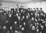 Group portrait of DPs and staff of the U.S. Army Chaplain's Center in Berlin at the dedication of the synagogue in the Schlachtensee displaced persons camp.