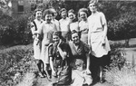 Group portrait of Jewish girls and teenagers in the Orthodox orphanage in Dinslaken, Germany prior to Kristallnacht

Pictured standing on the far right is Ruth Herz.