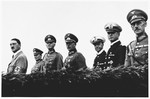 Hitler poses with members of the High Command during Wehrmacht Day celebrations.