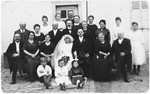Group portrait of relatives and guests at the wedding of Lilly Weinberg and Eugene Herz.