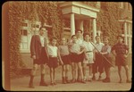 Group portrait of Jewish DP children standing outside the Ilaniah children's home in Apeldoorn.