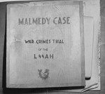 The book containing the indictments and charges against the defendants in the trial of 74 SS men charged with perpetrating the Malmedy atrocity.