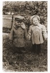 Benjamin Trzcina poses with his cousin Raisele Sandrovitch in the Kassel displaced persons camp.